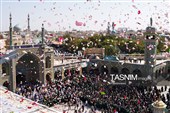 خادمان حرم در استقبال از کاروان نمادین بانوی کرامت