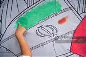 رنگ آمیزی دیوارنگاره توسط کودکان جهان اسلام یادبود شهدای مدرسه میناب